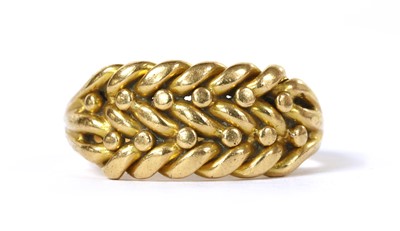 Lot 15 - An 18ct gold keeper ring