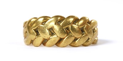 Lot 16 - An 18ct gold keeper ring