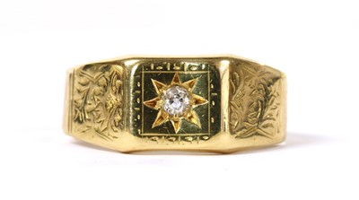 Lot 13 - An 18ct gold star set diamond ring