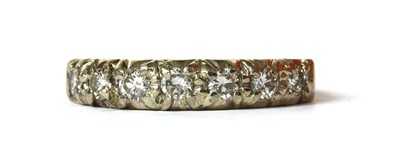 Lot 151 - An 18ct white gold diamond half eternity ring