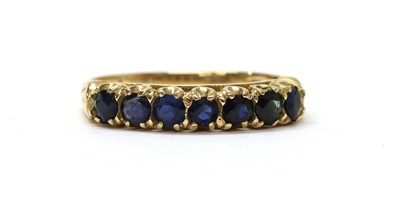 Lot 289 - A 9ct gold sapphire set half eternity ring