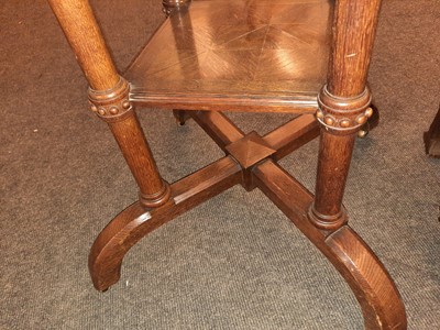 Lot 120 - A Howard & Sons oak octagonal centre table