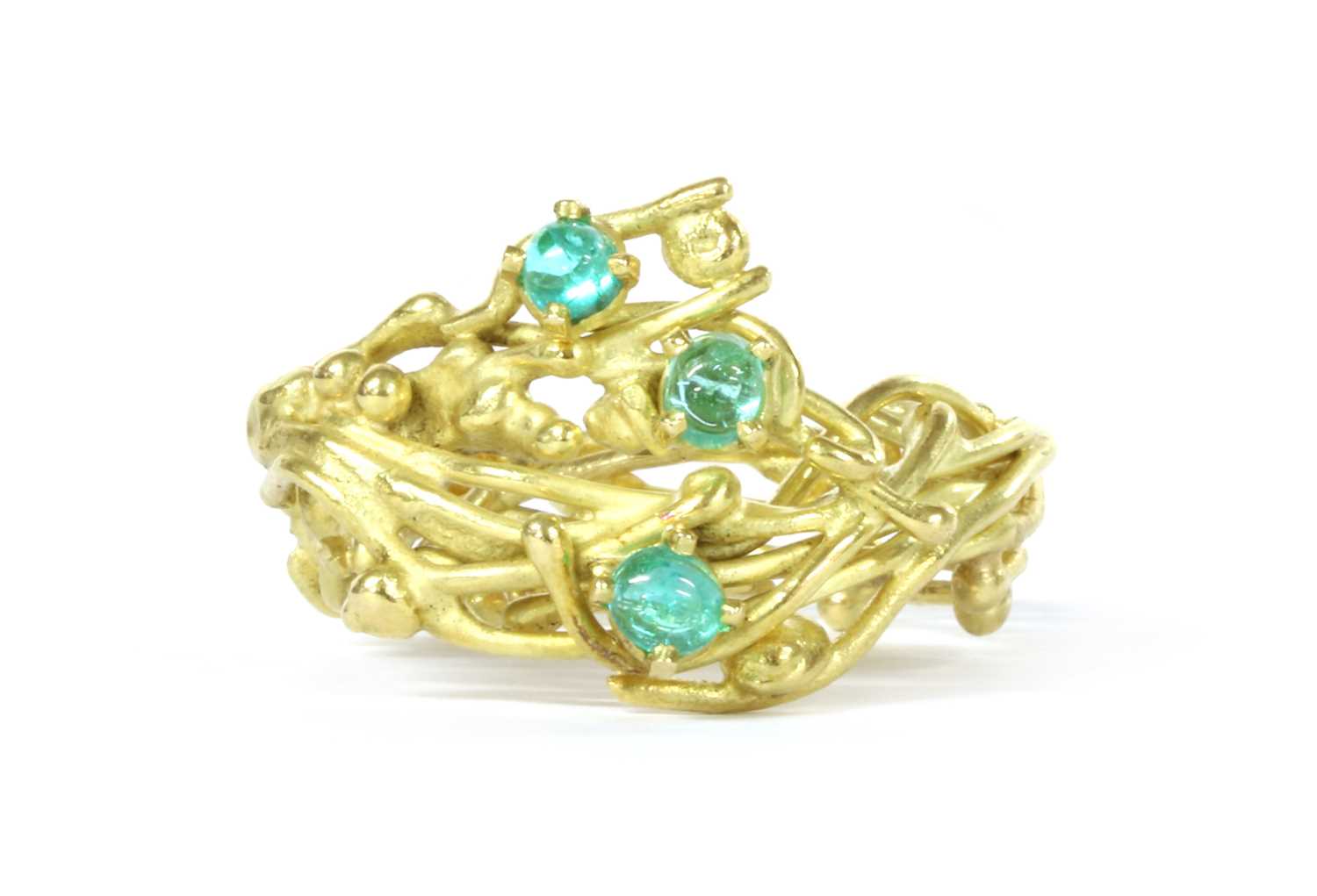 Lot 1072 - An 18ct gold three stone tourmaline ring