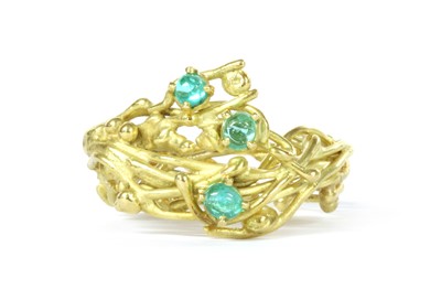 Lot 1072 - An 18ct gold three stone tourmaline ring