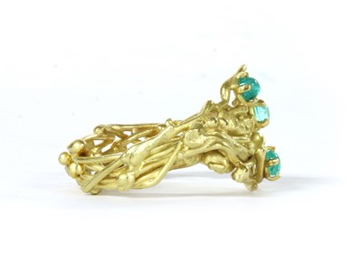 Lot 1072 - An 18ct gold three stone tourmaline ring