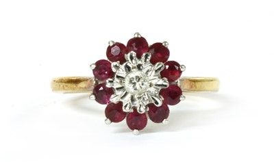 Lot 1151 - An 18ct gold diamond and ruby cluster ring