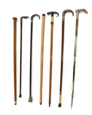 Lot 203 - Seven walking sticks
