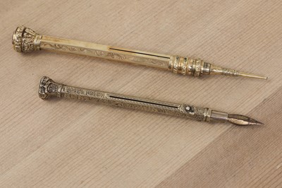 Lot 15 - Two Victorian gilt metal propelling pencils