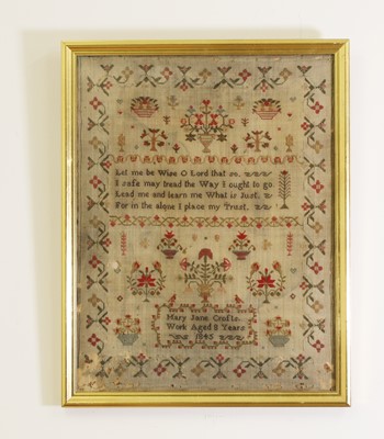 Lot 704 - A 19th century needlework sampler