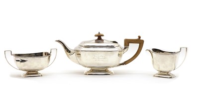 Lot 1 - A silver three piece tea service