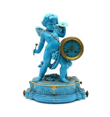 Lot 67 - A Continental faience table clock