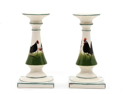 Lot 114 - A pair of candlesticks