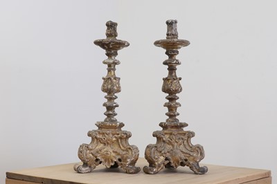 Lot 26 - A pair of baroque carved giltwood candlestands