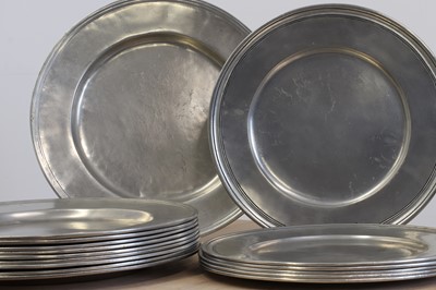 Lot 27 - A set of ten 18th century-style pewter chargers