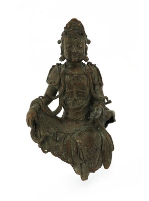 Lot 131 - A Chinese bronze guanyin