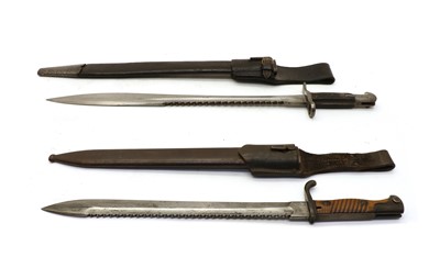 Lot 28 - Two WWl saw back bayonets
