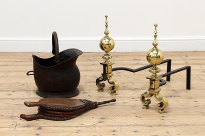 Lot 101 - A pair of brass andirons
