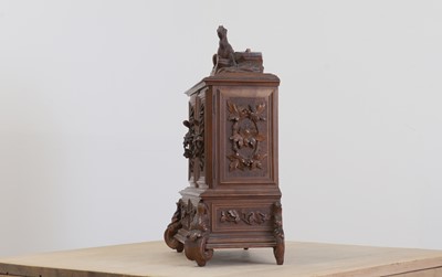 Lot 150 - A Black Forest carved wooden table cabinet
