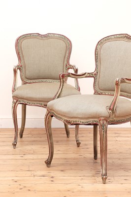 Lot 84 - A pair of Italian-style painted elbow chairs