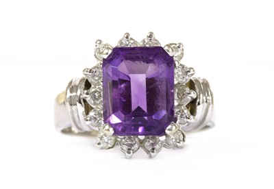 Lot 1247 - An American white gold, amethyst and diamond rectangular cluster ring