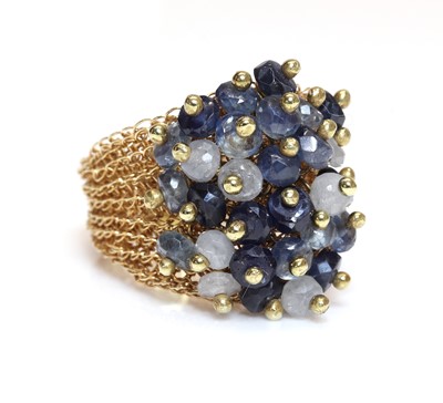 Lot 335 - An 18ct gold sapphire cluster ring, by Rina Tairo