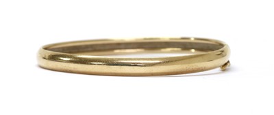 Lot 194 - A gold bangle