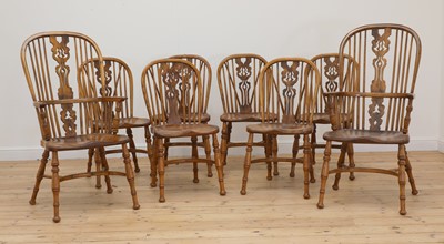 Lot 718 - A set of eight elm and ash Windsor-style dining chairs