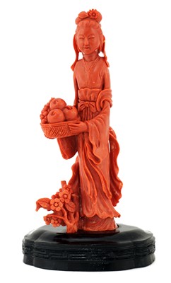 Lot 174 - A Chinese coral figure