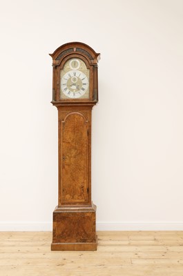 Lot 331 - A figured walnut longcase clock by Nicholas Lambert of London