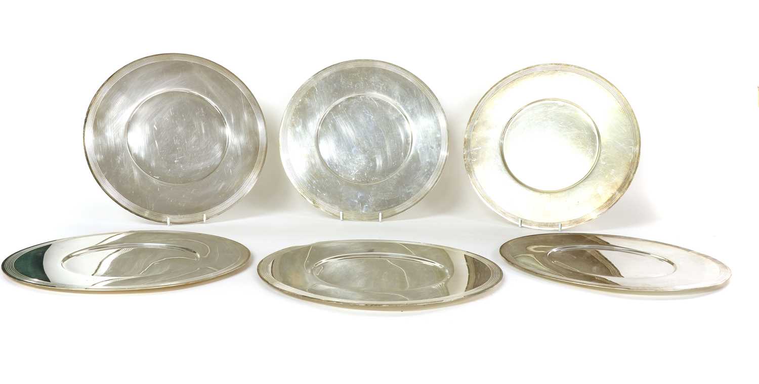 Lot 40 - A group of six silver plated chargers