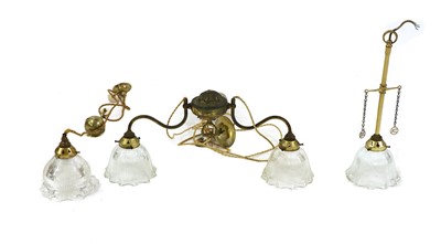 Lot 171 - A collection of brass lighting
