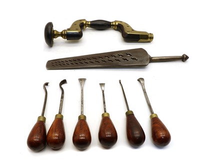 Lot 154 - An Ultimatum brass mounted ebony brace