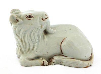 Lot 324 - A Chinese white-glazed goat