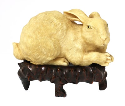 Lot 257 - A Japanese ivory okimono