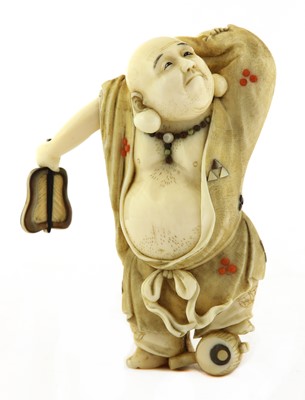 Lot 431 - A Japanese ivory okimono