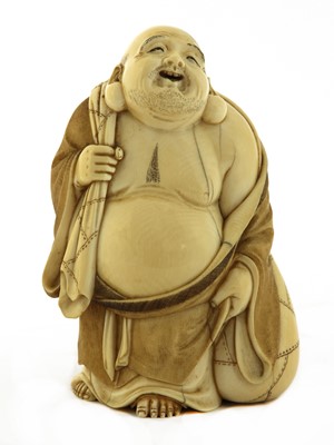 Lot 255 - A Japanese ivory okimono