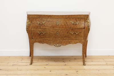 Lot 115 - A parquetry bombé commode chest