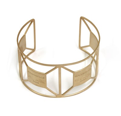 Lot 514 - A Chanel 'Gabrielle' torque bangle