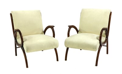 Lot 254 - A pair of walnut lounge chairs