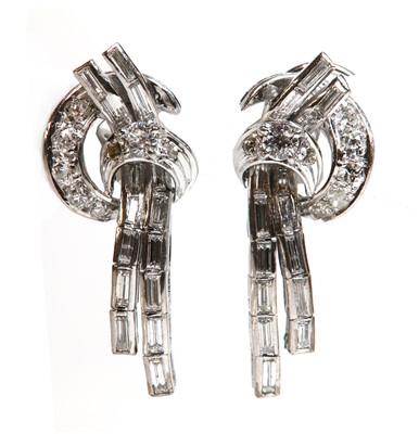 Lot 259 - A pair of diamond set waterfall drop earrings
