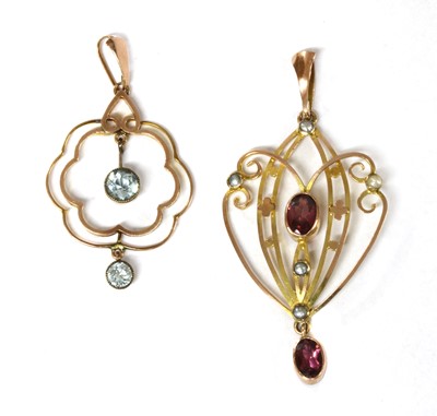 Lot 1050 - Two Edwardian gold pendants