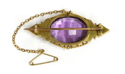 Lot 1018 - A Victorian gold amethyst brooch