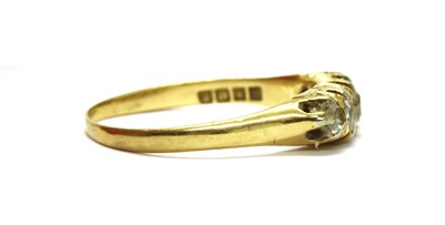 Lot 21 - An 18ct gold five stone diamond ring