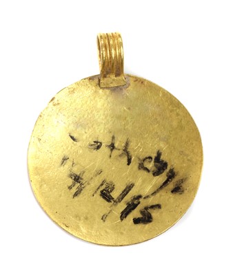Lot 15 - A Russian gold enamel icon pendant