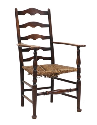 Lot 165 - A Lutyens-style oak ladderback armchair