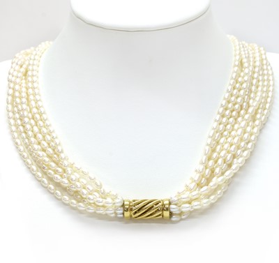 Lot 326 - A seven row uniform cultured freshwater pearl necklace, with gold twist clasp