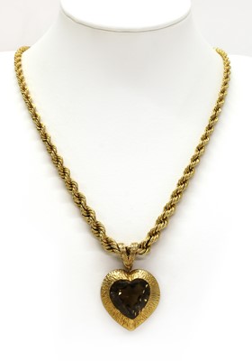 Lot 249 - A 9ct gold smoky quartz pendant