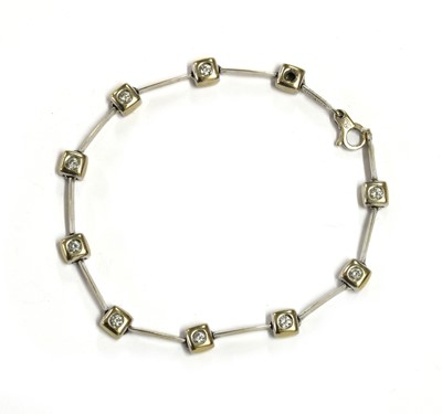 Lot 163 - A white gold diamond bracelet, by Chimento
