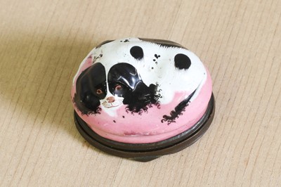 Lot 208A - An enamel patch box in the form of a spaniel