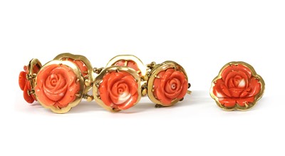 Lot 1073 - A gold carved coral ring and bracelet suite